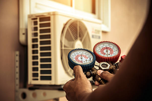 Professional Air Conditioning Service technician working in Meridian, PA